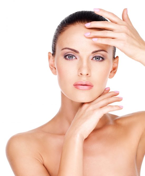 Beautiful healthy  face of the young pretty white woman with fresh skin - isolated on white